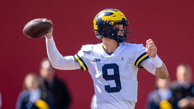 Oct 8, 2022; Bloomington, Indiana, USA; Michigan Wolverines quarterback J.J. McCarthy (9) throws a pass during the second half against the Indiana Hoosiers at Memorial Stadium. Wolverines won 31 to 10. Mandatory Credit: Marc Lebryk-USA TODAY Sports