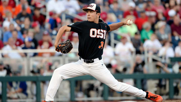 Jun 26, 2018; Omaha, NE, USA; Oregon State Beavers pitcher Christian Chamberlain (34) pitches in the fifth inning against the Arkansas Razorbacks in game one of the championship series of the College World Series at TD Ameritrade Park. Mandatory Credit: Steven Branscombe-USA TODAY Sports
