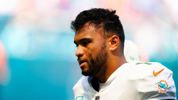Dolphins quarterback Tua Tagovailoa leaves field during game against the Bills.