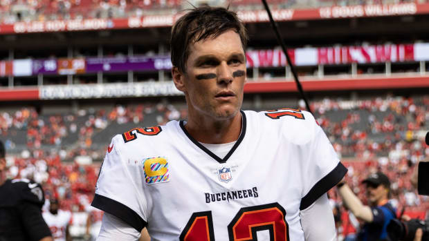 Buccaneers quarterback Tom Brady (12) walks off the field after the game against the Falcons.