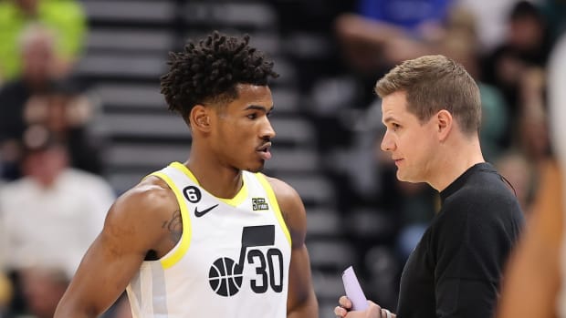 Utah Jazz forward Ochai Agbaji (30) speaks with head coach Will Hardy during a break in second quarter action against the Dallas Mavericks at Vivint Arena.