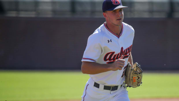 Bobby Pierce jogs in from the outfield against Louisiana Tech in fall exhibition action