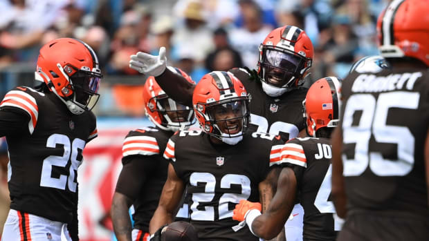 Sep 11, 2022; Charlotte, North Carolina, USA; Cleveland Browns safety Grant Delpit (22) celebrates with linebacker Jeremiah Owusu-Koramoah (28) and safety Ronnie Harrison Jr. (33) and safety John Johnson III (43) and defensive end Myles Garrett (95) after intercepting the ball in the second quarter at Bank of America Stadium. Mandatory Credit: Bob Donnan-USA TODAY Sports