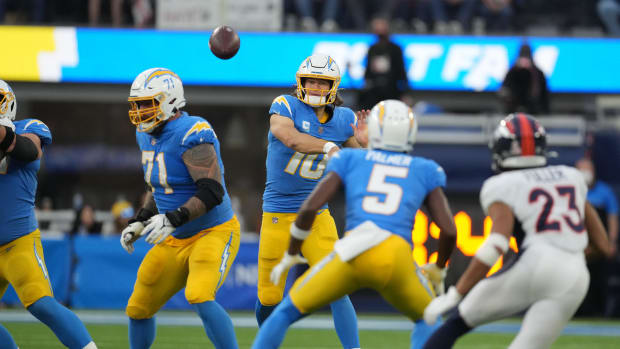 Jan 2, 2022; Inglewood, California, USA; Los Angeles Chargers quarterback Justin Herbert (10) throws the ball against the Denver Broncos in the second half at SoFi Stadium. Mandatory Credit: Kirby Lee-USA TODAY Sports