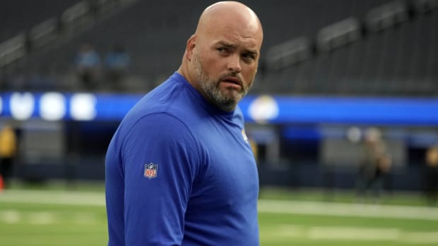 Former Rams offensive lineman Andrew Whitworth looks on before a game between Los Angeles and the Houston Texans.