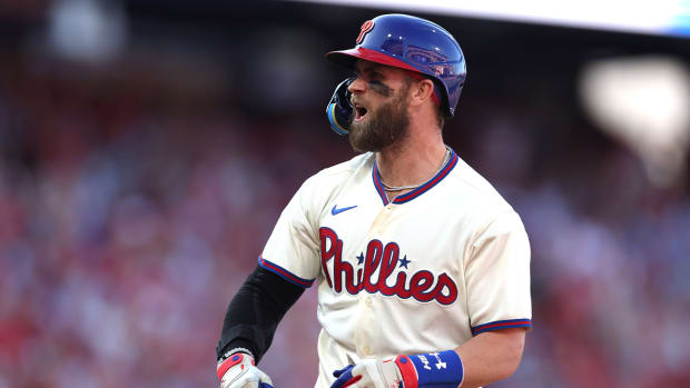 Oct 15, 2022; Philadelphia, Pennsylvania, USA; Philadelphia Phillies designated hitter Bryce Harper (3) reacts after hitting an RBI single in the sixth inning against the Atlanta Braves in game four of the NLDS for the 2022 MLB Playoffs at Citizens Bank Park.