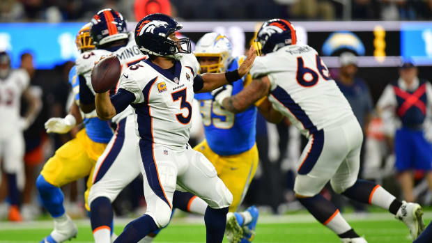 Denver Broncos quarterback Russell Wilson (3) throws against the Los Angeles Chargers during the second half at SoFi Stadium.