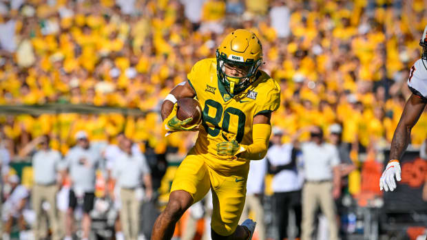 Oct 1, 2022; Waco, Texas, USA; Baylor Bears wide receiver Monaray Baldwin (80) runs with the ball after a catch against the Oklahoma State Cowboys during the second half at McLane Stadium.