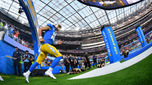 Oct 17, 2022; Inglewood, California, USA; Los Angeles Chargers quarterback Justin Herbert (10) is introduced before playing against the Denver Broncos at SoFi Stadium. Mandatory Credit: Gary A. Vasquez-USA TODAY Sports