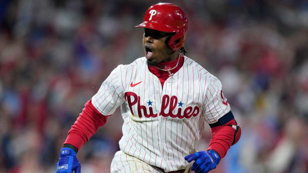 Phillies' Jean Segura celebrates his two-run single during the fourth inning vs. the Padres.