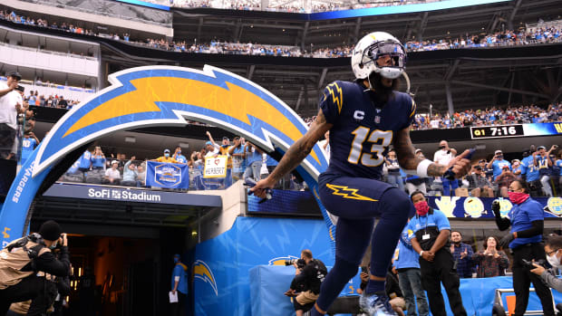 Oct 31, 2021; Inglewood, California, USA; Los Angeles Chargers wide receiver Keenan Allen (13) runs onto the field during player introductions before the game against the New England Patriots at SoFi Stadium. Mandatory Credit: Orlando Ramirez-USA TODAY Sports