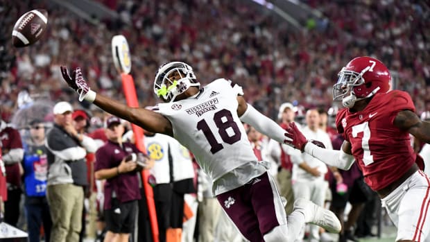 Mississippi State Bulldogs wide receiver Justin Robinson (18) cannot catch a pass in the end zone against Alabama Crimson Tide defensive back Eli Ricks (7) during the first half at Bryant-Denny Stadium.