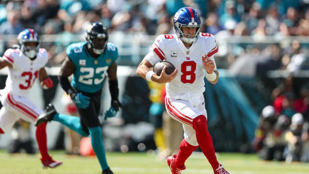 Oct 23, 2022; Jacksonville, Florida, USA; New York Giants quarterback Daniel Jones (8) runs with the ball against the Jacksonville Jaguars in the first quarter at TIAA Bank Field.