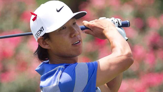 Anthony Kim watches a shot at the 2011 Players Championship.