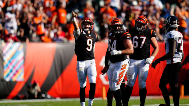 Cincinnati Bengals quarterback Joe Burrow (9) celebrates a first down after running a QB keeper in the fourth quarter of the NFL Week 7 game between the Cincinnati Bengals and the Atlanta Falcons at Paycor Stadium in downtown Cincinnati on Sunday, Oct. 23, 2022. The Bengals won 35-17. Mandatory Credit: Sam Greene-The Enquirer Atlanta Falcons At Cincinnati Bengals Nfl Week 7