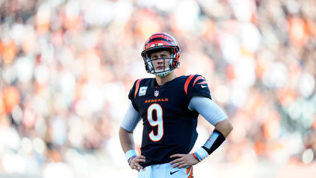 Cincinnati Bengals quarterback Joe Burrow (9) watches an official review on the big screen in the fourth quarter of the NFL Week 7 game between the Cincinnati Bengals and the Atlanta Falcons at Paycor Stadium in downtown Cincinnati on Sunday, Oct. 23, 2022. The Bengals won 35-17.