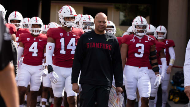 ; Stanford Cardinal head coach David Shaw leads players onto the field before the game against the Arizona State Sun Devils at Stanford Stadium.