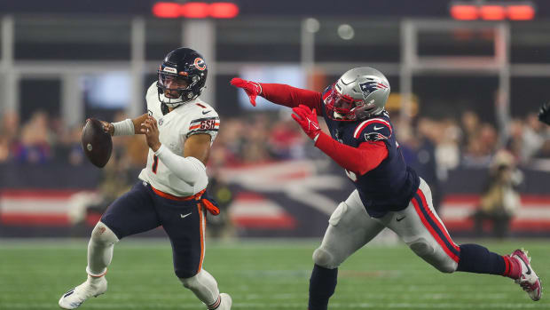 Oct 24, 2022; Foxborough, Massachusetts, USA; New England Patriots outside linebacker Matt Judon (9) chase down Chicago Bears quarterback Justin Fields (1) during the first half at Gillette Stadium.