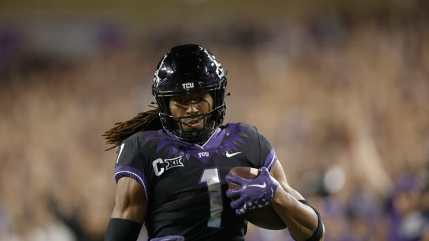 Oct 22, 2022; Fort Worth, Texas, USA; TCU Horned Frogs wide receiver Quentin Johnston (1) scores a touchdown against the Kansas State Wildcats in the third quarter at Amon G. Carter Stadium. Mandatory Credit: Tim Heitman-USA TODAY Sports
