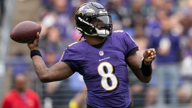 Oct 23, 2022; Baltimore, Maryland, USA; Baltimore Ravens quarterback Lamar Jackson (8) throws the ball against the Cleveland Browns during the first half at M&T Bank Stadium.