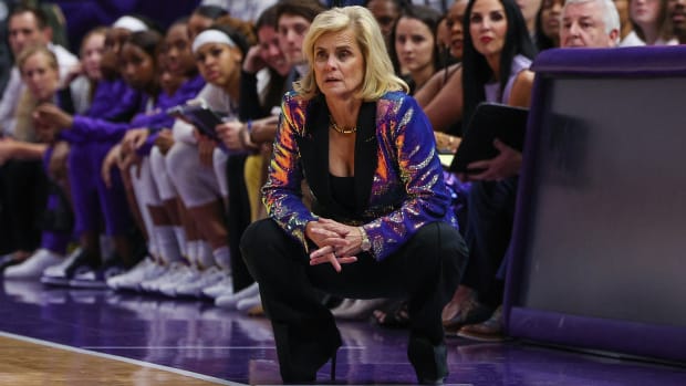 LSU women’s basketball coach Kim Mulkey watches from the sidelines.