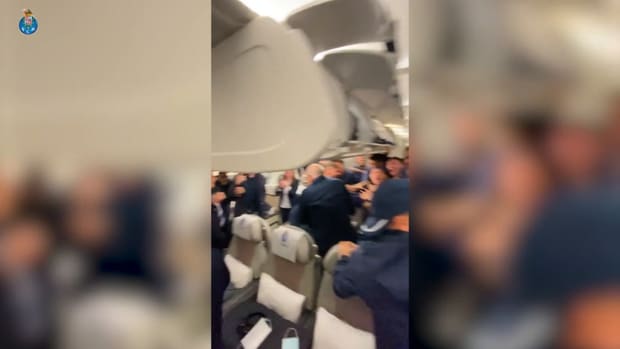 Porto stars celebrate qualifying for the UCL Round of 16 on the plane