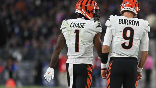 Oct 9, 2022; Baltimore, Maryland, USA; Cincinnati Bengals wide receiver Ja'Marr Chase (1) speaks with quarterback Joe Burrow (9) during the game against the Baltimore Ravens at M&T Bank Stadium. Mandatory Credit: Tommy Gilligan-USA TODAY Sports