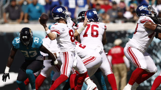 Oct 23, 2022; Jacksonville, Florida, USA; New York Giants quarterback Daniel Jones (8) looks to throw a pass against the Jacksonville Jaguars during the first quarter at TIAA Bank Field.