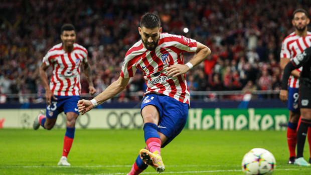 Yannick Carrasco pictured taking a penalty for Atletico Madrid against Bayer Leverkusen in a 2-2 draw in October 2022