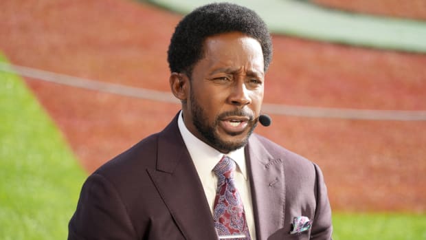 ESPN broadcaster Desmond Howard looks on from the set of the pregame show at the 2022 Rose Bowl.