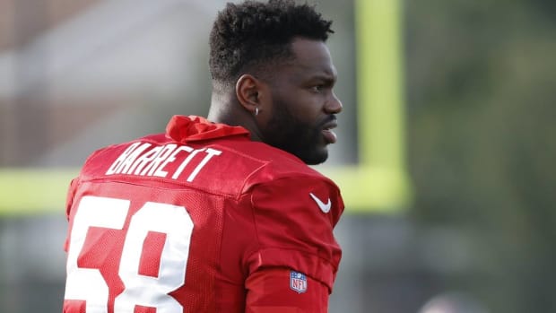 Buccaneers pass rusher Shaq Barrett looks on during a 2021 training camp practice