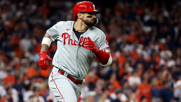 Phillies right fielder Nick Castellanos runs to first base after hitting an RBI single in Game 1 of the World Series.