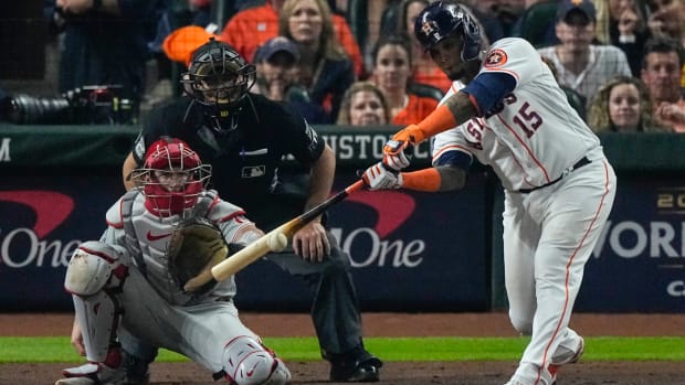 Houston Astros’ Martin Maldonado hits hits an RBI single during the second inning in Game 1 of baseball’s World Series between the Houston Astros and the Philadelphia Phillies on Friday, Oct. 28, 2022, in Houston. (AP Photo/Sue Ogrocki)