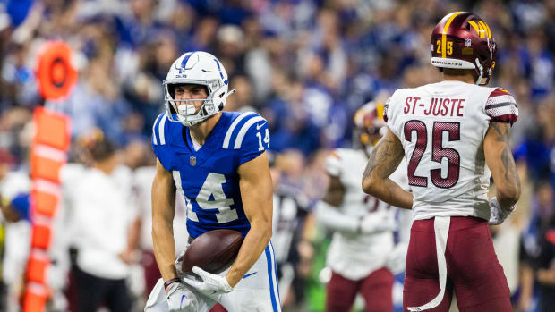 Oct 30, 2022; Indianapolis, Indiana, USA; Indianapolis Colts wide receiver Alec Pierce (14) celebrates his catch in the second half against the Washington Commanders at Lucas Oil Stadium.