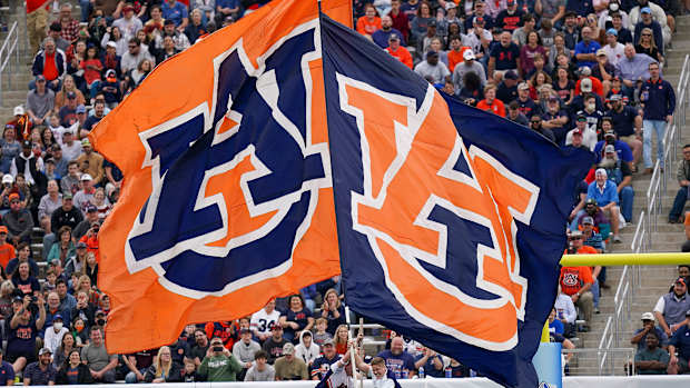 Auburn flags fly at a bowl game