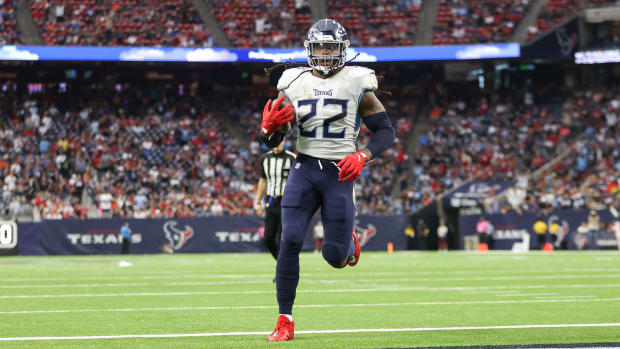 Oct 30, 2022; Houston, Texas, USA; Tennessee Titans running back Derrick Henry (22) rushes for a touchdown during the third quarter against the Houston Texans at NRG Stadium. Mandatory Credit: Troy Taormina-USA TODAY Sports