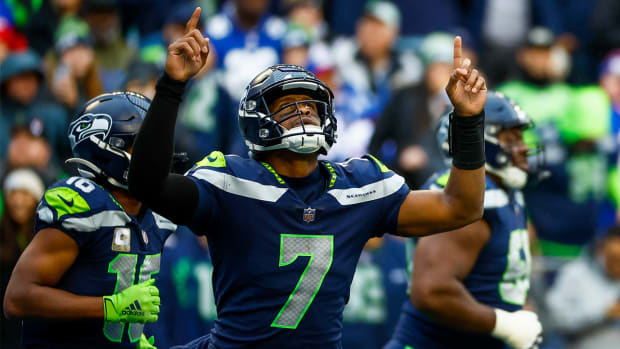 Oct 30, 2022; Seattle, Washington, USA; Seattle Seahawks quarterback Geno Smith (7) celebrates after throwing a touchdown pass against the New York Giants during the fourth quarter at Lumen Field.