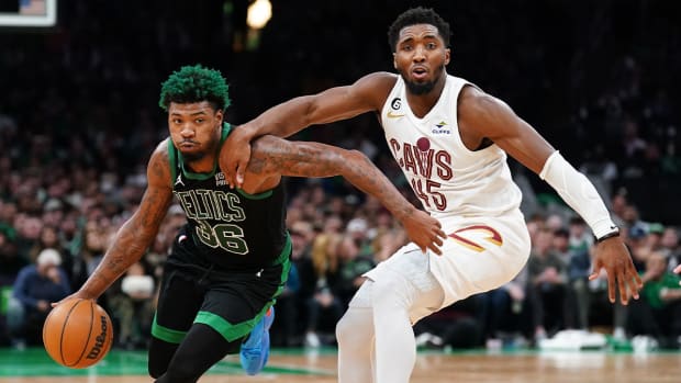 Oct 28, 2022; Boston, Massachusetts, USA; Cleveland Cavaliers guard Donovan Mitchell (45) defends against Boston Celtics guard Marcus Smart (36) in the second half at TD Garden.