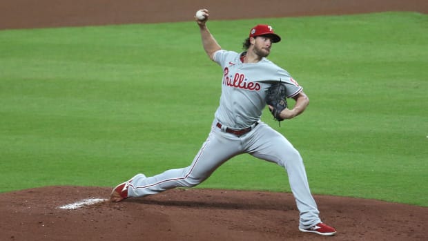Oct 28, 2022; Houston, Texas, USA; Philadelphia Phillies starting pitcher Aaron Nola (27) throws a pitch against the Houston Astros during the first inning in game one of the 2022 World Series at Minute Maid Park.
