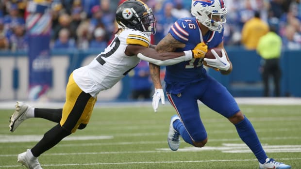Bills receiver Isaiah Hodgins (16) runs for yards against Pittsburgh cornerback James Pierre after a fourth quarter reception during their game Sunday, Oct. 9, 2022 at Highmark Stadium in Orchard Park.