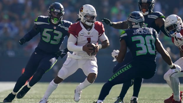 Arizona Cardinals quarterback Kyler Murray (1) scrambles against the Seattle Seahawks during the second half of an NFL football game in Seattle, Sunday, Oct. 16, 2022.