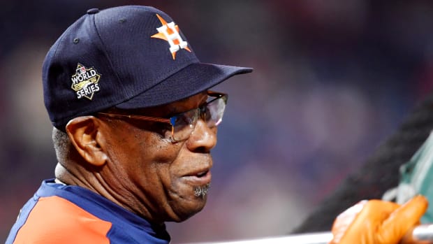 Astros manager Dusty Baker looks out at the field before a World Series Game