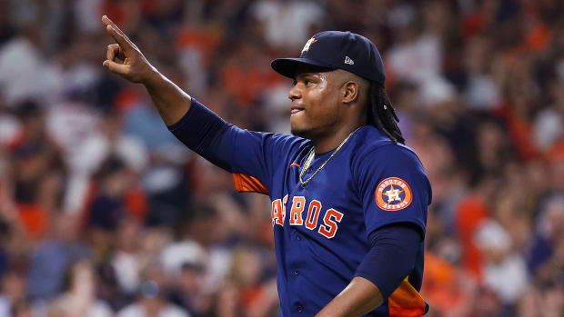 Astros pitcher Framber Valdez salutes the crowd during Game 6 of the World Series