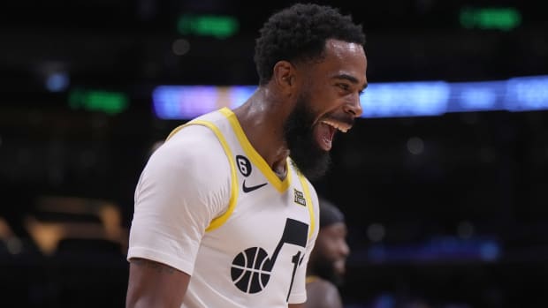 Utah Jazz guard Mike Conley (11) celebrates against the Los Angeles Lakers in the second half at Crypto.com Arena.