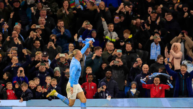 Erling Haaland pictured celebrating after scoring a late winner in Manchester City's 2-1 victory over Fulham in November 2022