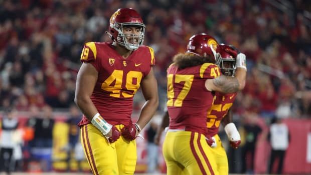 Nov 5, 2022; Los Angeles, California, USA; USC Trojans defensive lineman Tuli Tuipulotu (49) reacts after a play during the second quarter against the California Golden Bears at United Airlines Field at Los Angeles Memorial Coliseum. Mandatory Credit: Kiyoshi Mio-USA TODAY Sports