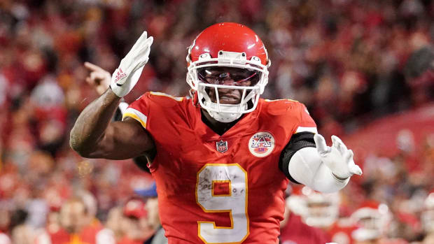 Nov 6, 2022; Kansas City, Missouri, USA; Kansas City Chiefs wide receiver JuJu Smith-Schuster (9) celebrates after a catch and run against the Tennessee Titans during overtime of the game at GEHA Field at Arrowhead Stadium. Mandatory Credit: Denny Medley-USA TODAY Sports