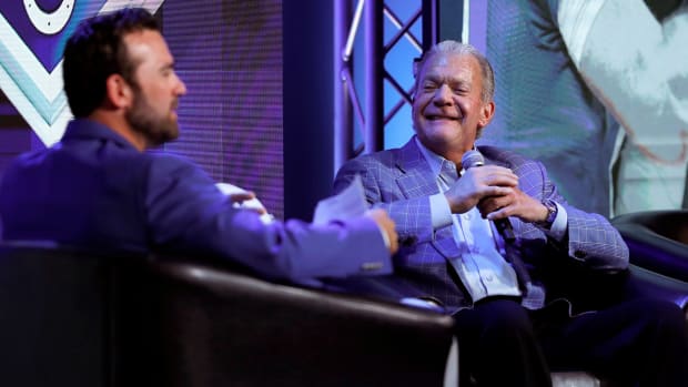 Jim Irsay talks to Jeff Saturday during a Colts town hall in 2019