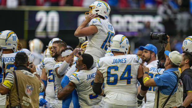 Chargers kicker Cameron Dicker is carried off the field after his game-winning field goal against the Falcons in Week 9.
