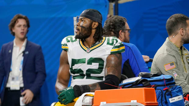 Packers linebacker Rashan Gray is carted off the field after suffering an injury vs. the Lions.